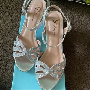 Never worn silver sparkly heels